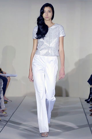 white silk cropped top and tailored pants