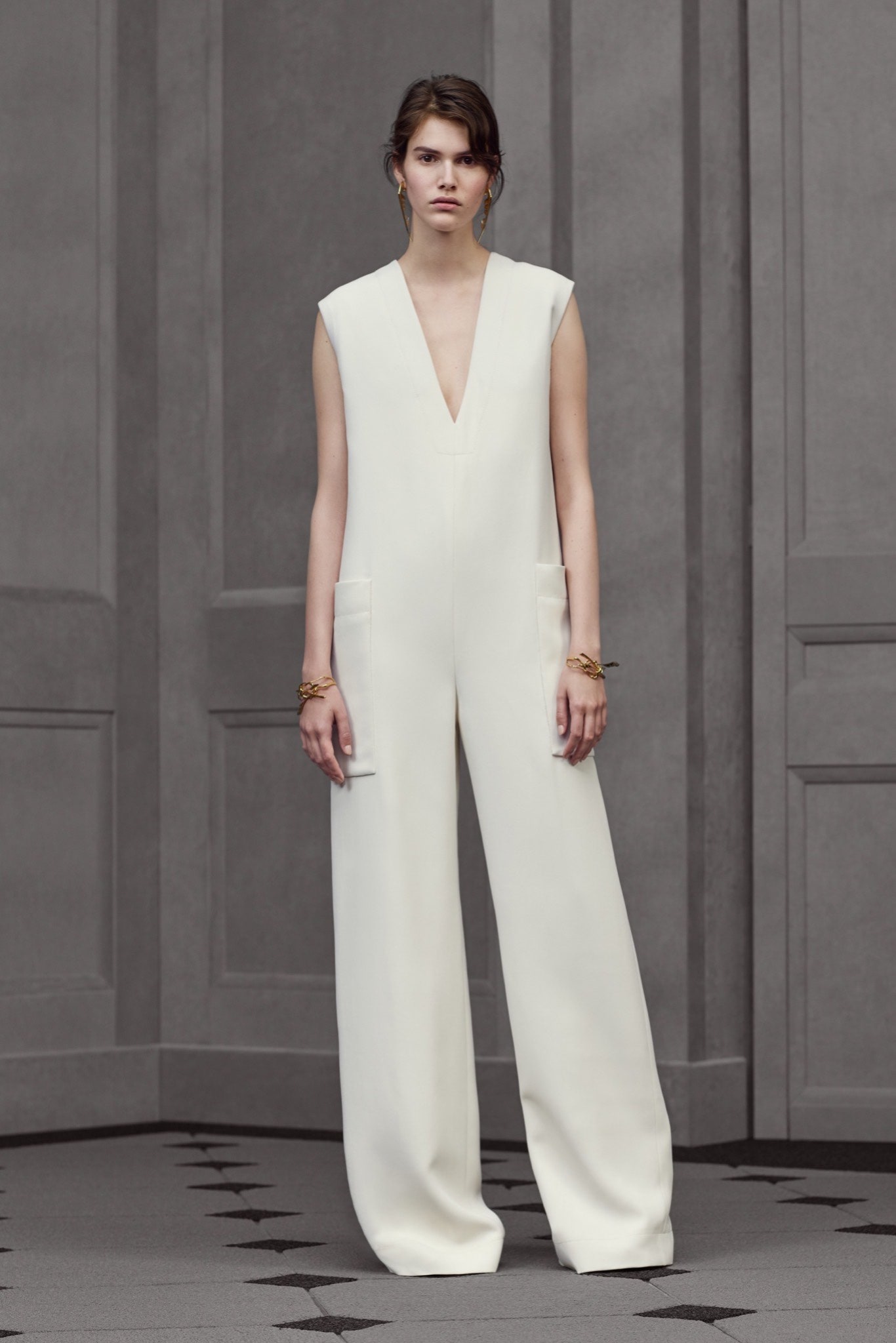 white sleeveless relaxed jumpsuit