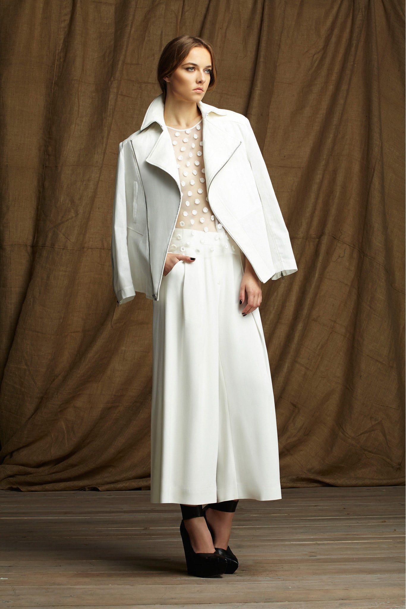 white leather jacket with polka-dot top