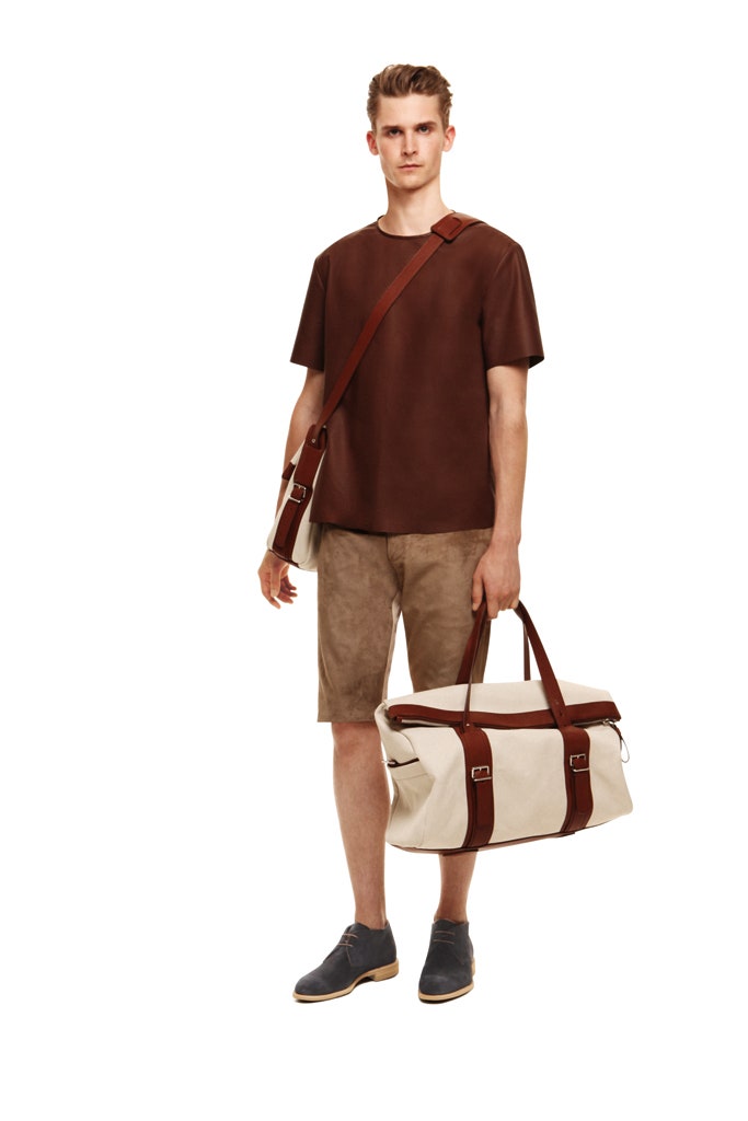 brown leather t-shirt and beige shorts