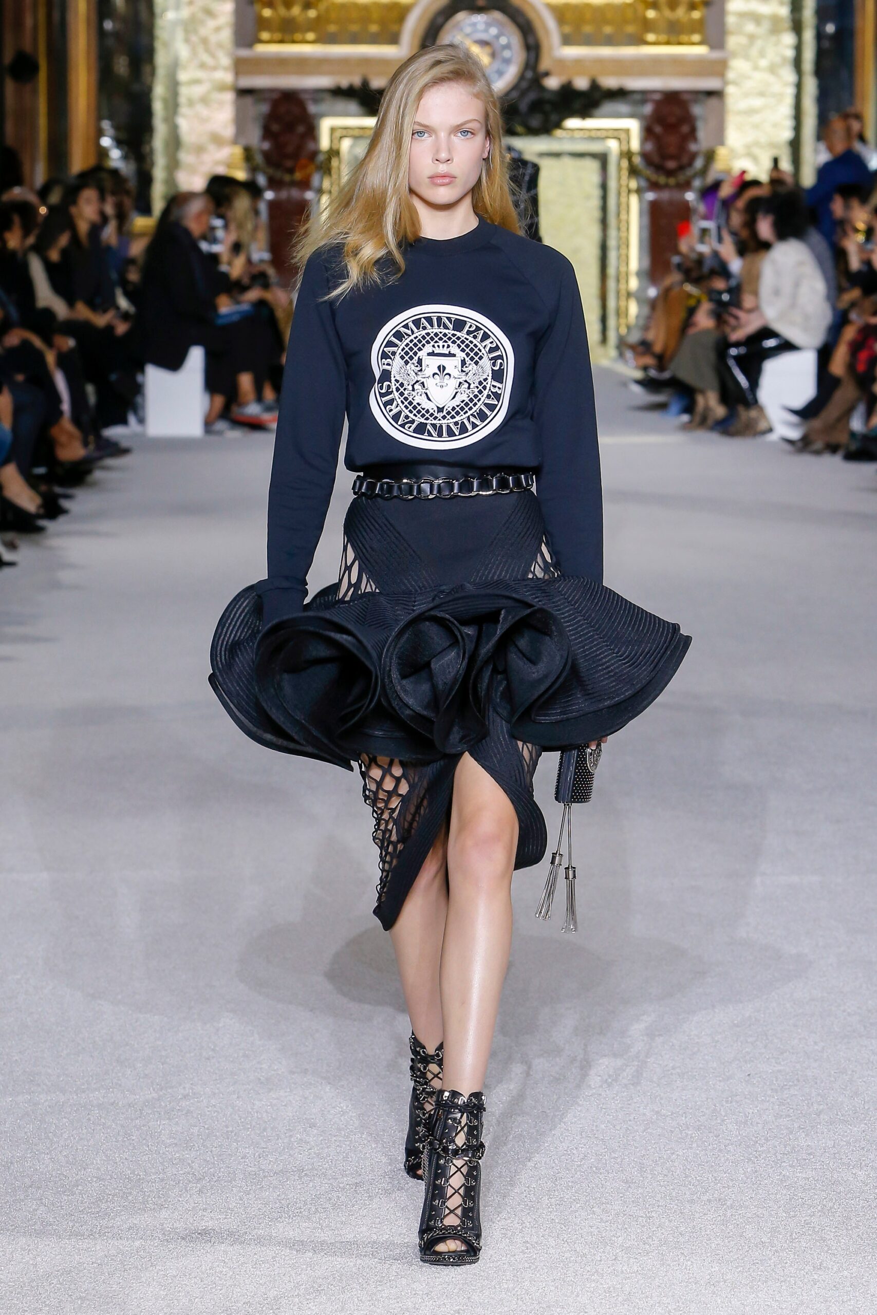 black fitted top and ruffled skirt