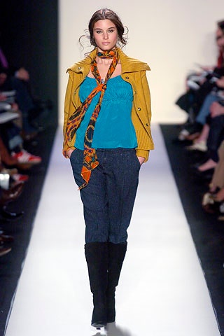 yellow jacket blue top gray pants