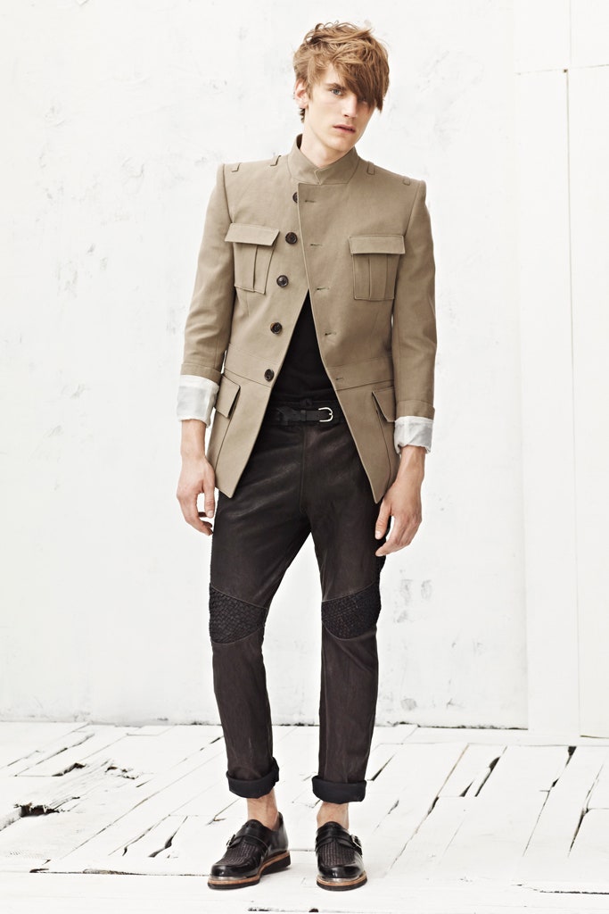 beige structured jacket with black pants