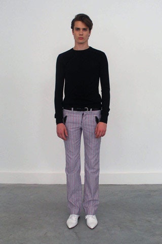 black fitted top with striped pants