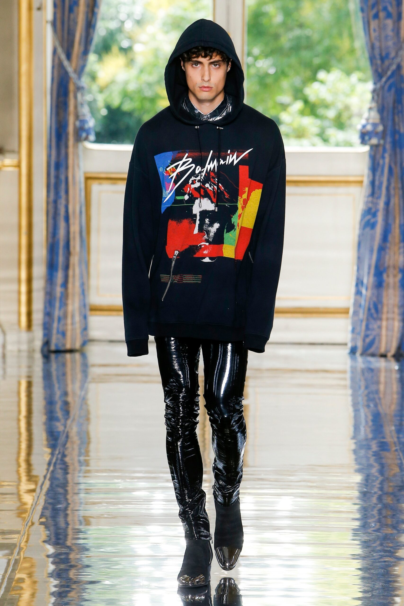 black hoodie and vinyl pants