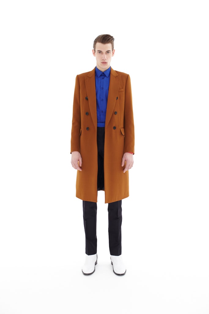 brown tailored coat with blue shirt