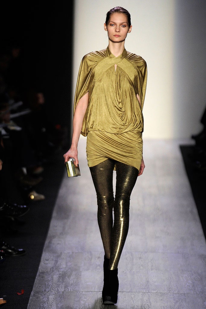 gold draped top with metallic leggings