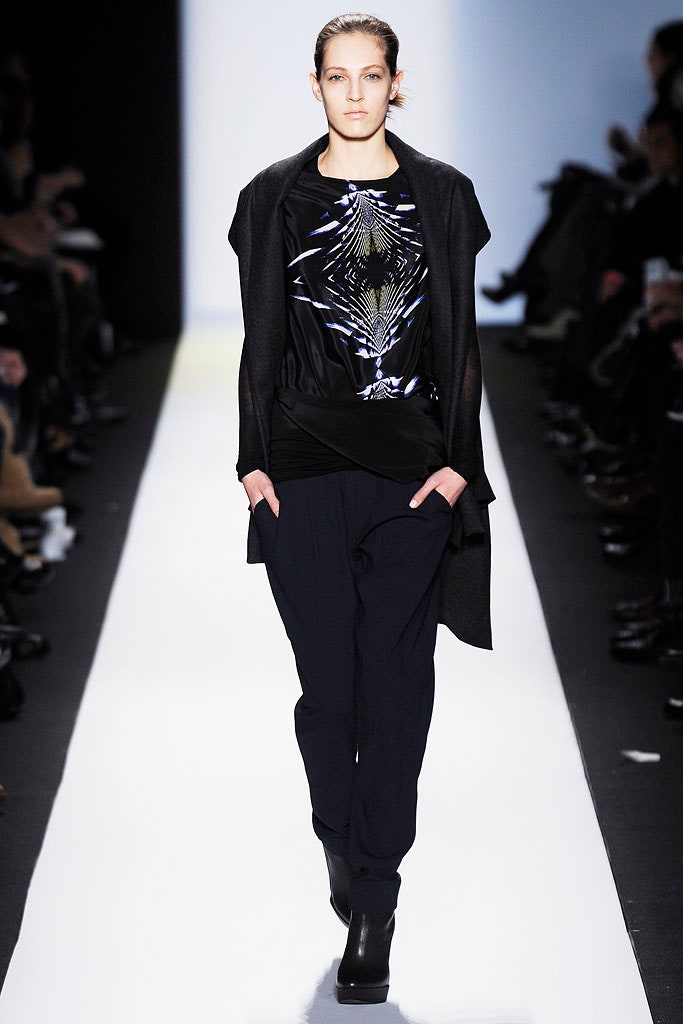 black silk top with relaxed pants