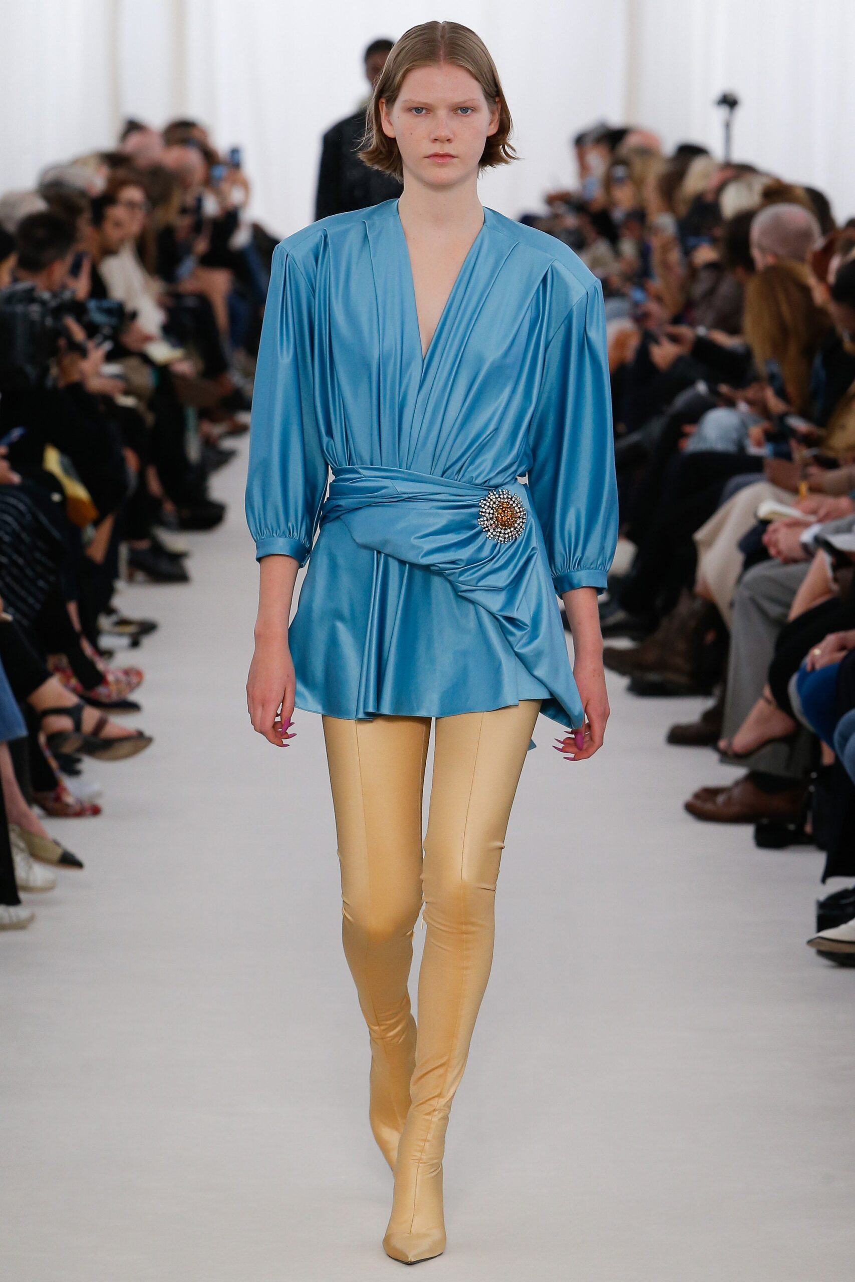 blue silk fitted top with yellow pants