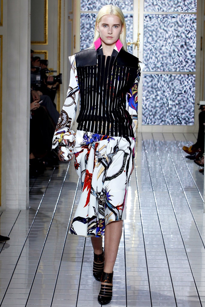 fitted black and multi blouse with asymmetric skirt