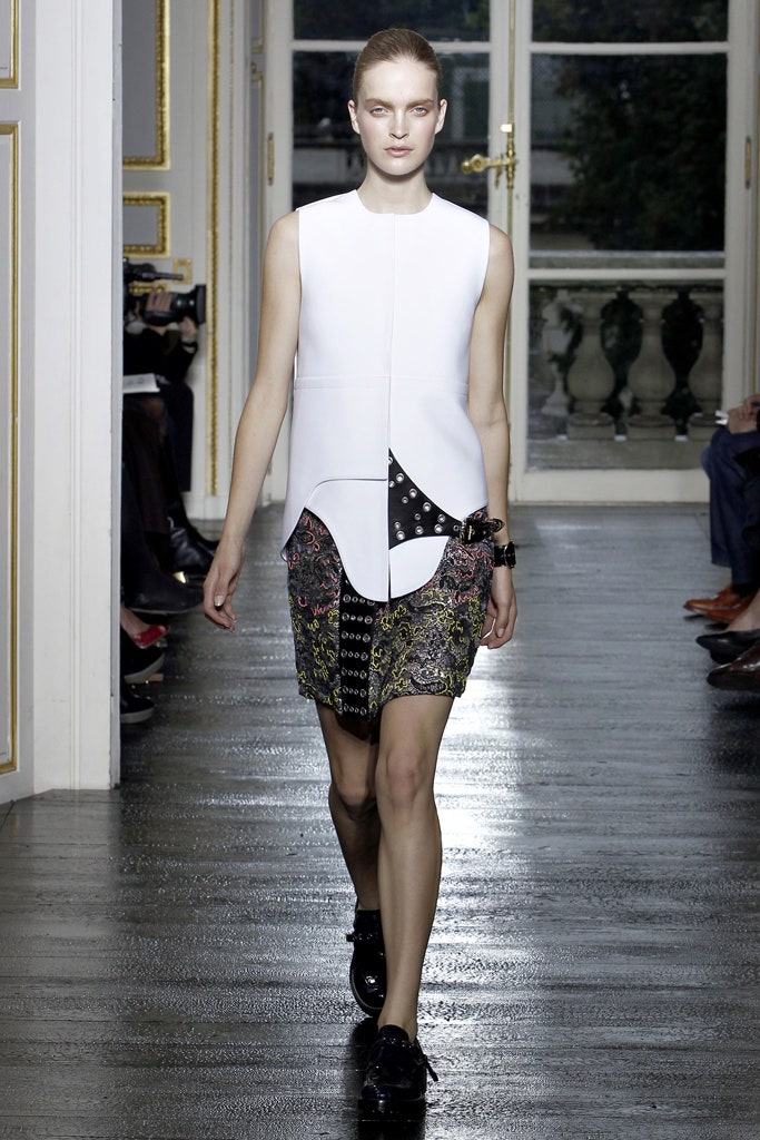 white fitted top with black mini skirt