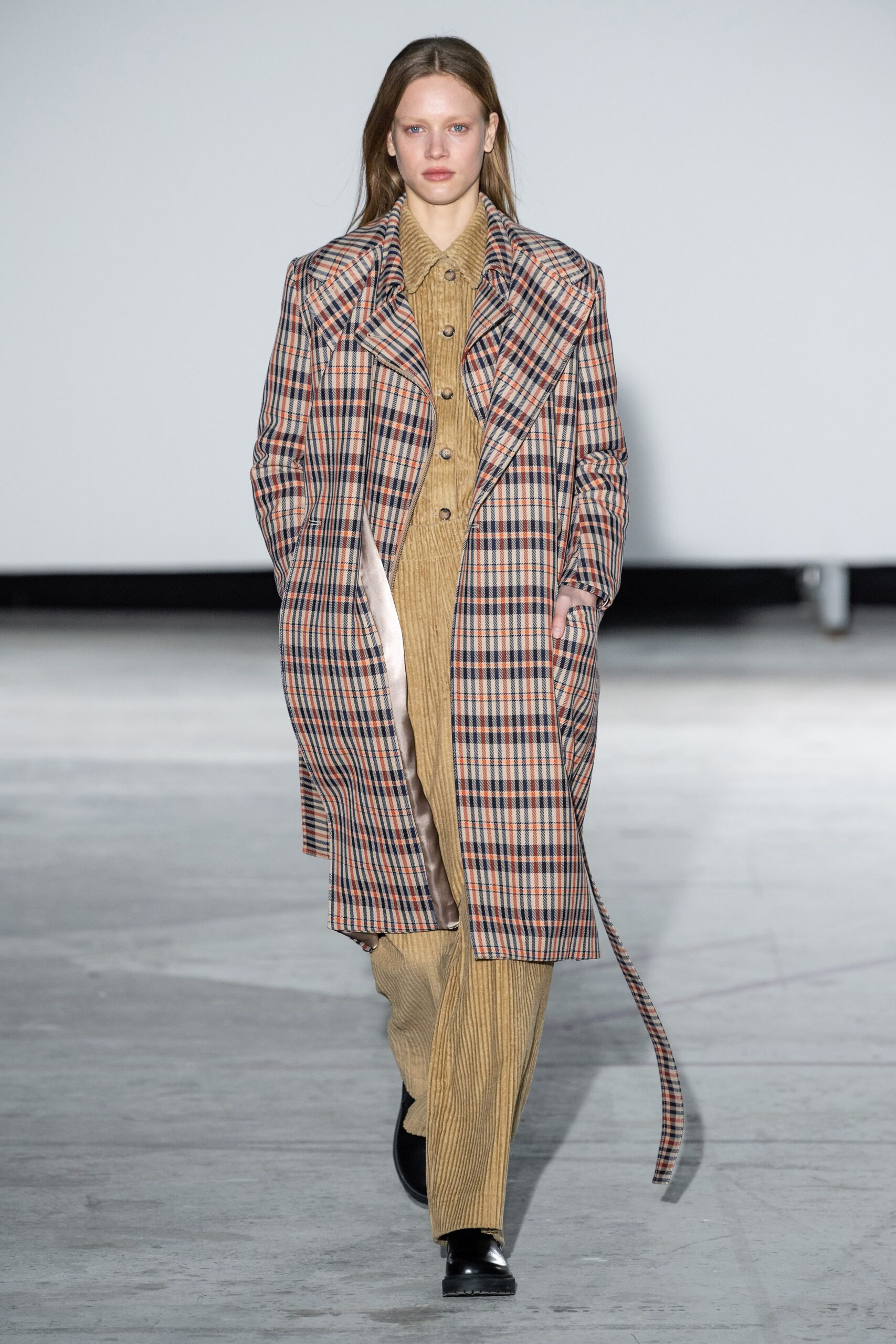 checked brown beige coat and beige jumpsuit