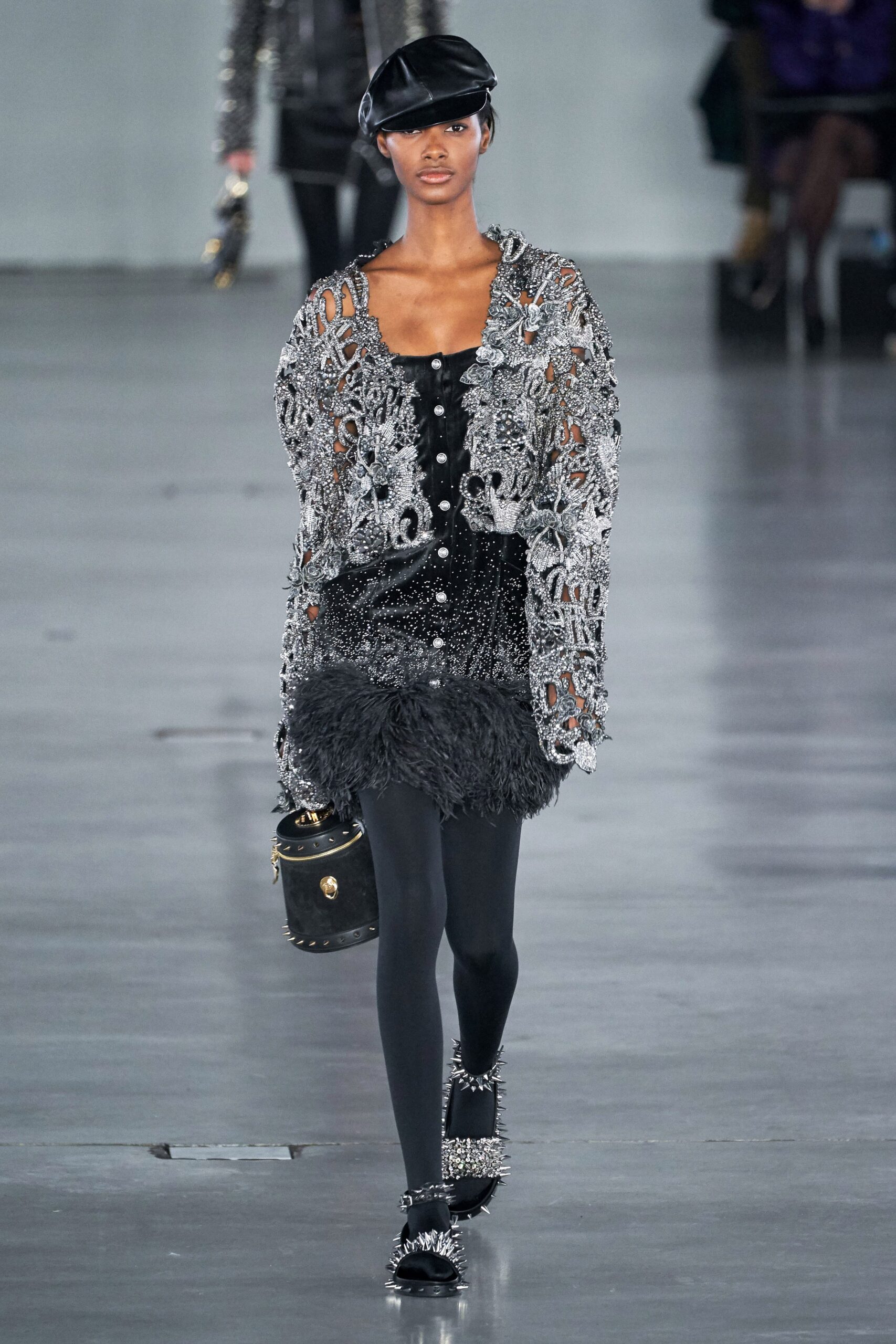 black feather mini skirt with embellished top