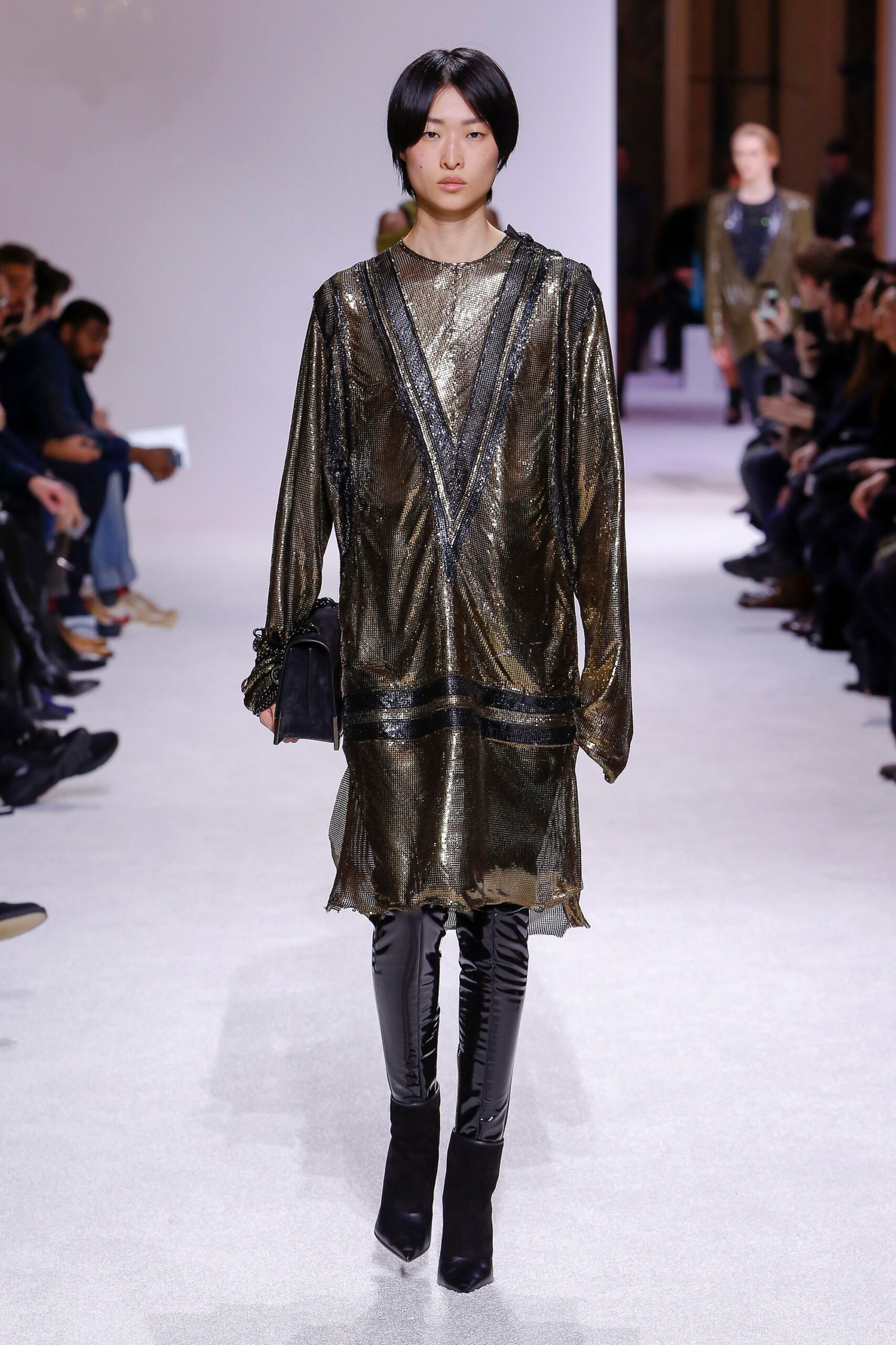 gold relaxed dress with black pants