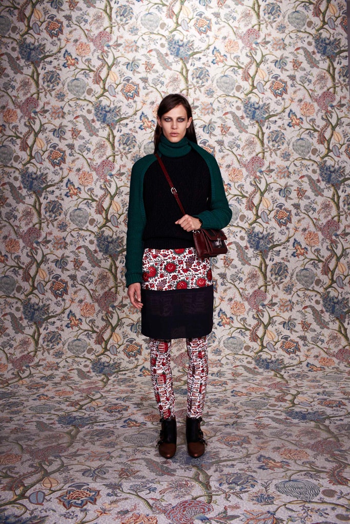 black and green fitted sweater with printed leggings