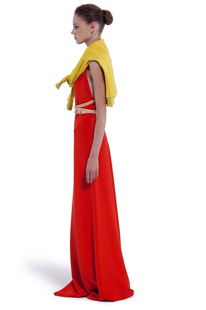 red silk gown with yellow sweater