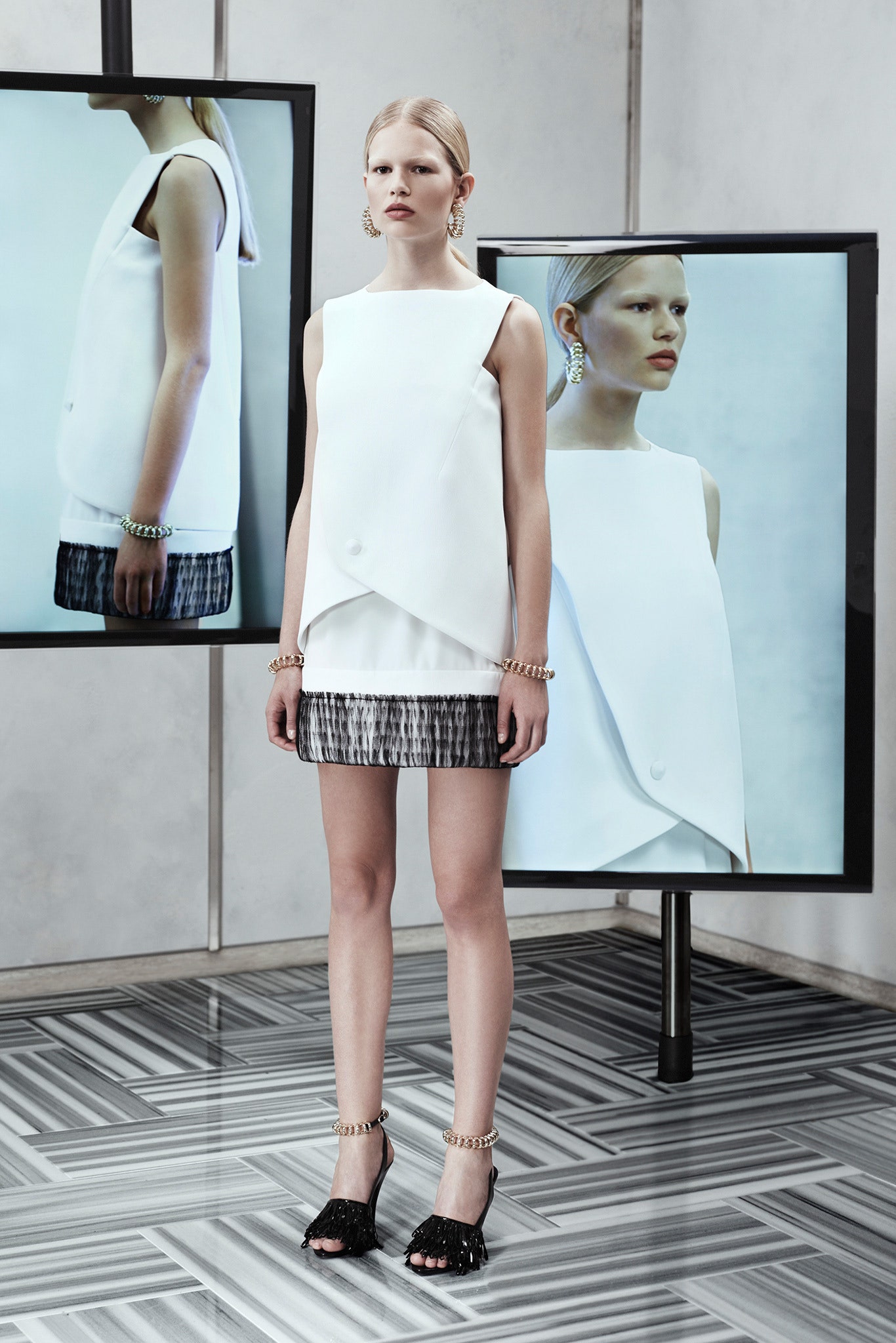 white fitted top with black mini skirt