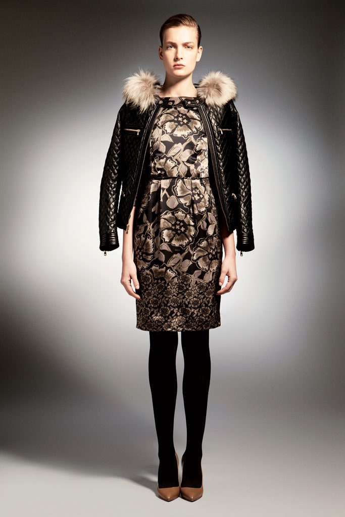 black leather long-sleeve collared fitted quilted zippered jacket
