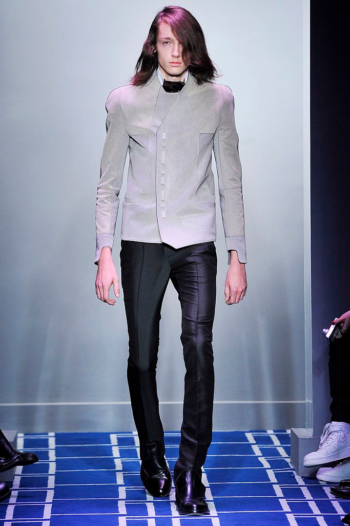 gray tailored blazer and black slim pants