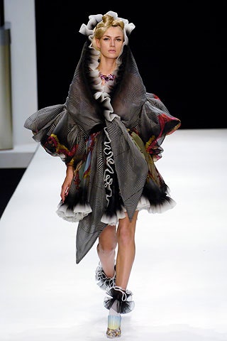 black and white ruffled mini dress with cape