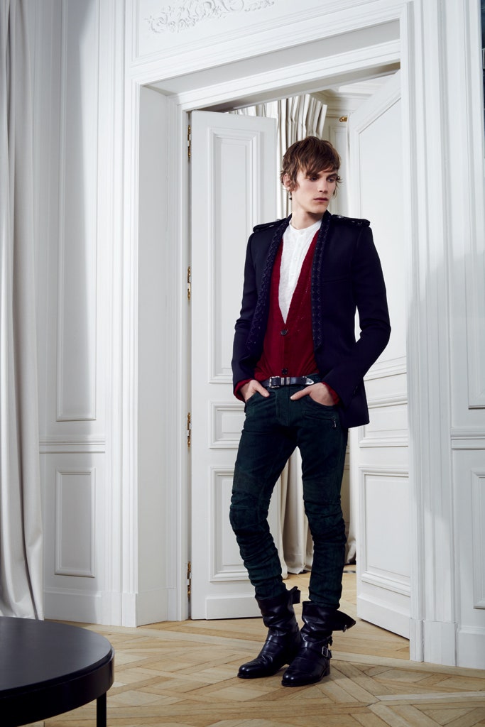 black jacket red vest green pants
