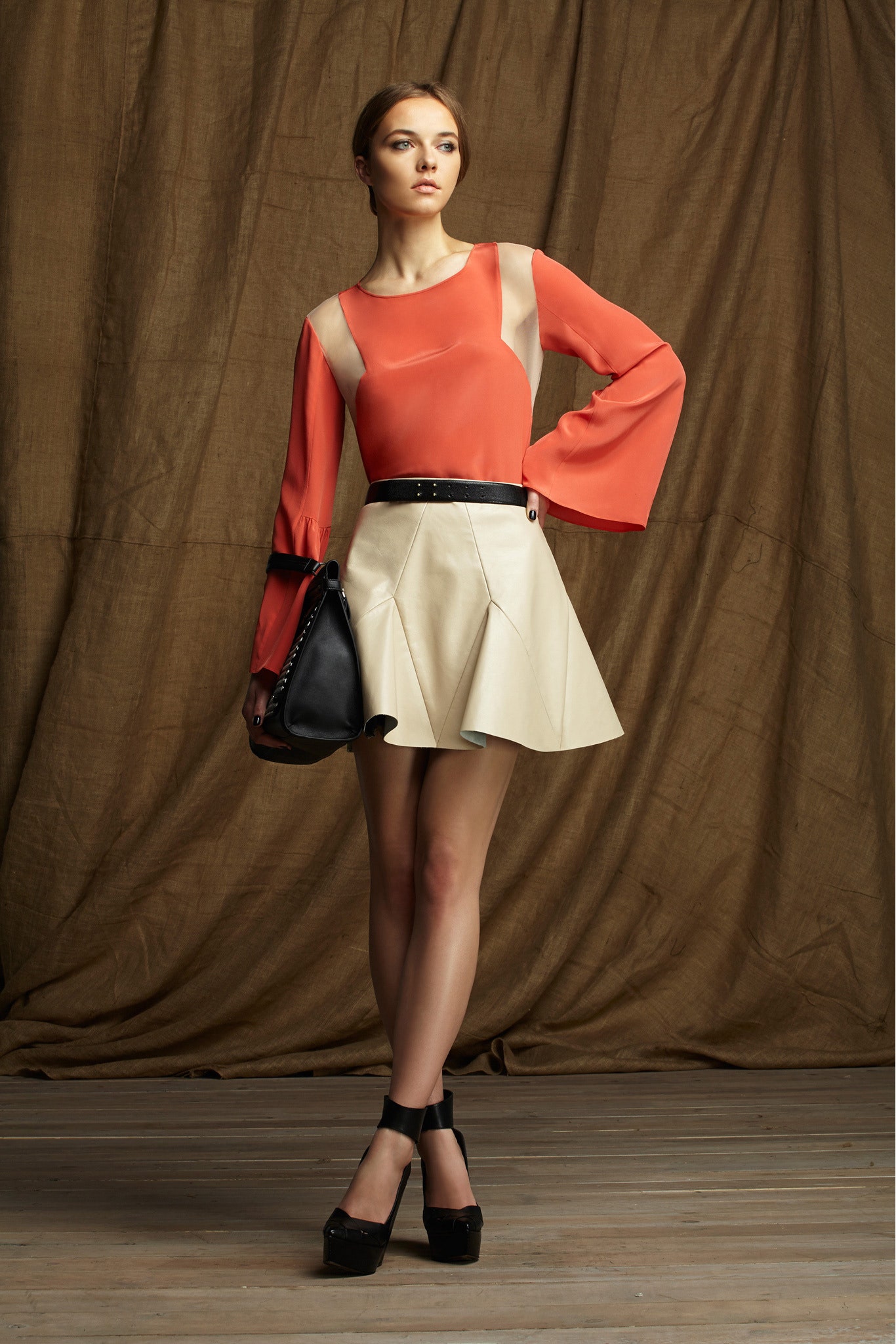 red silk top with flared mini skirt