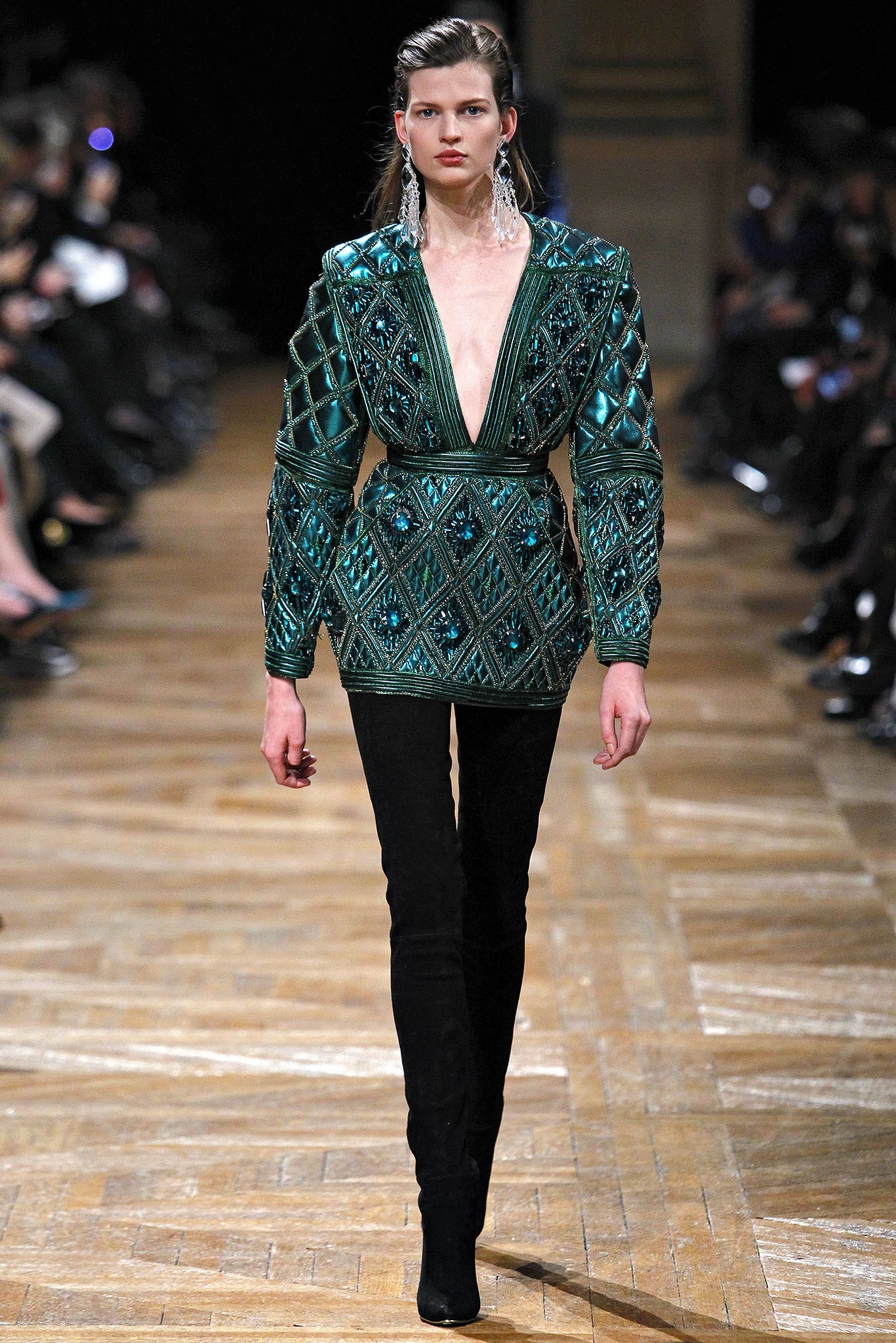 green embroidered blouse with black pants