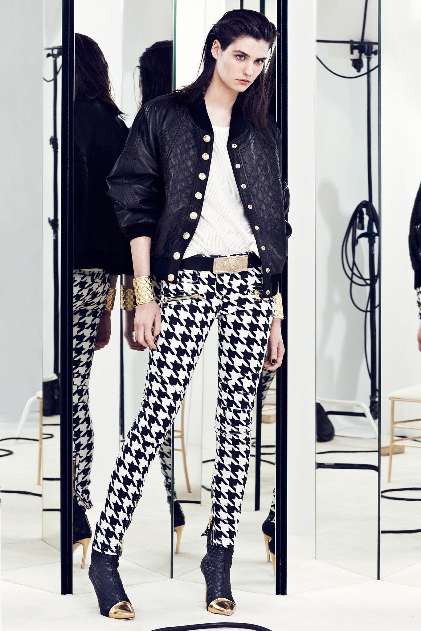 black leather jacket with checked pants