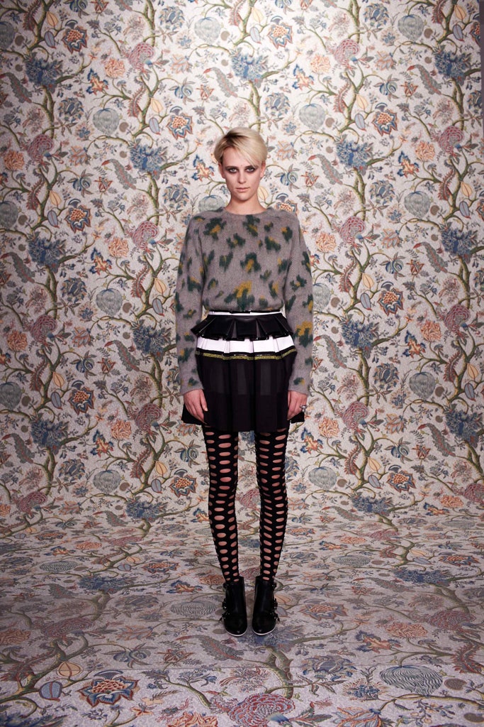 gray embroidered sweater black skirt