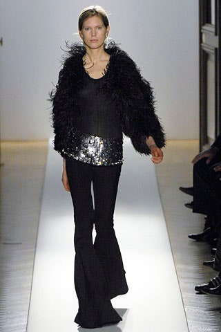 black sequined top with fur coat