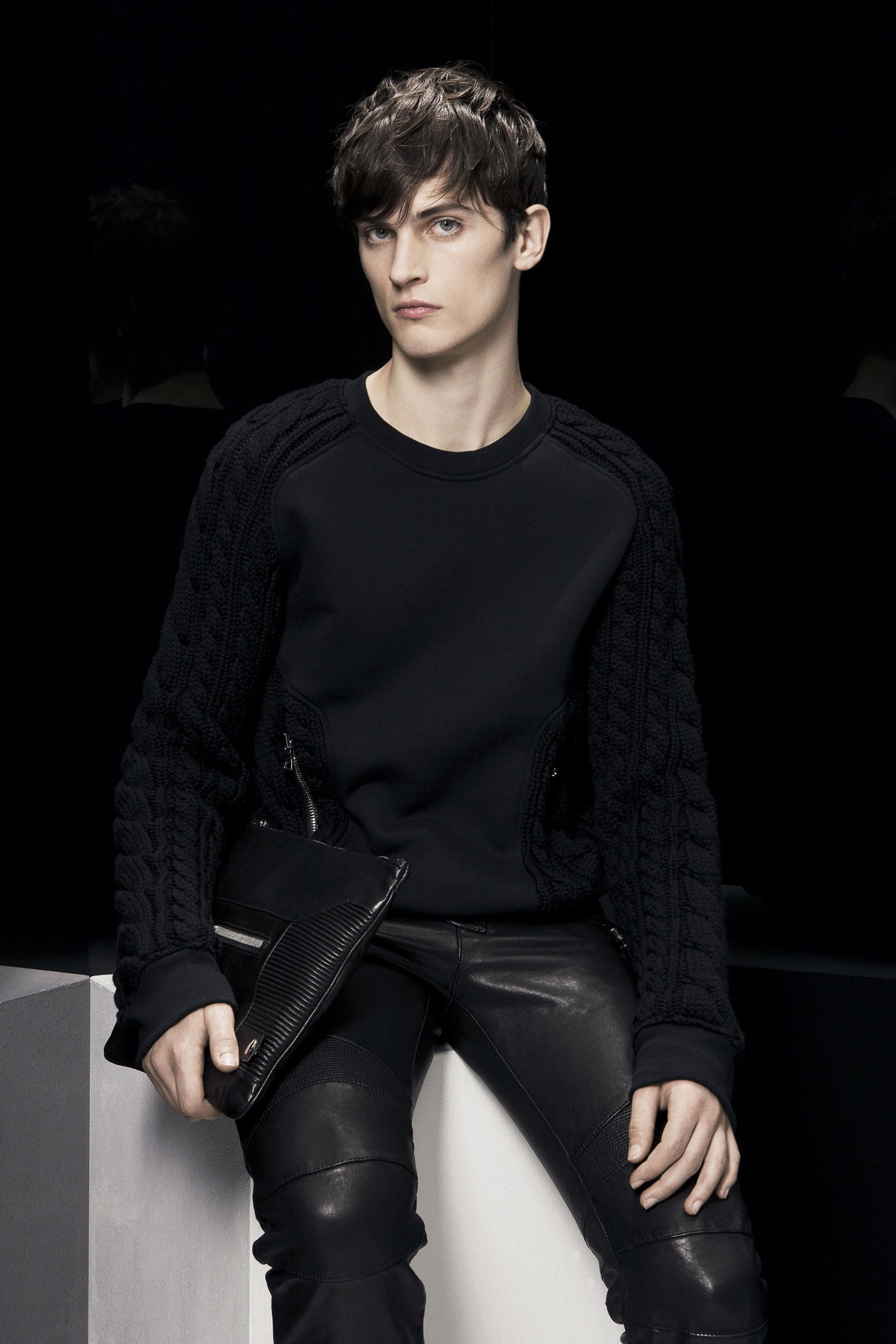 black fitted sweater and leather pants