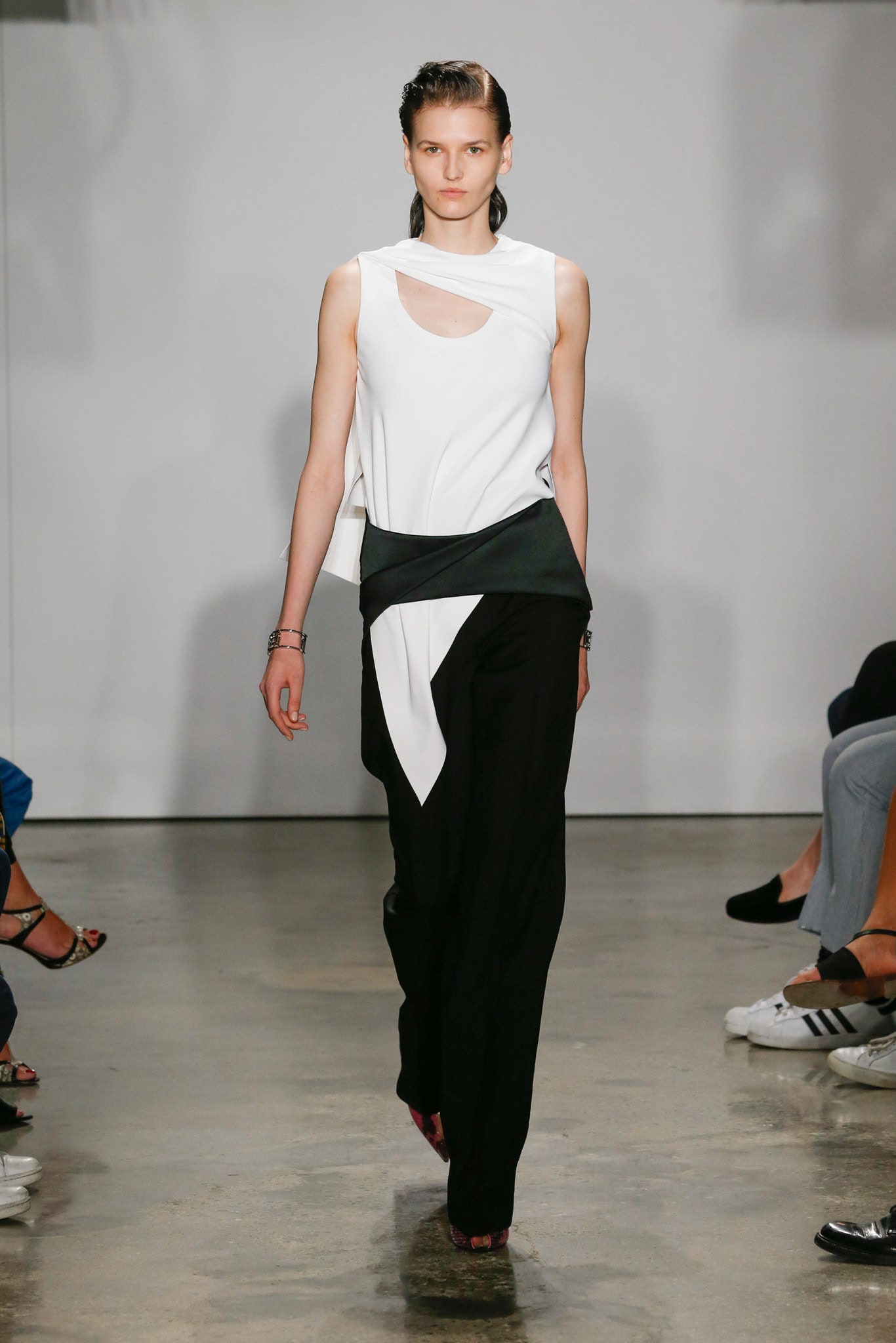 fitted white top and tailored black pants