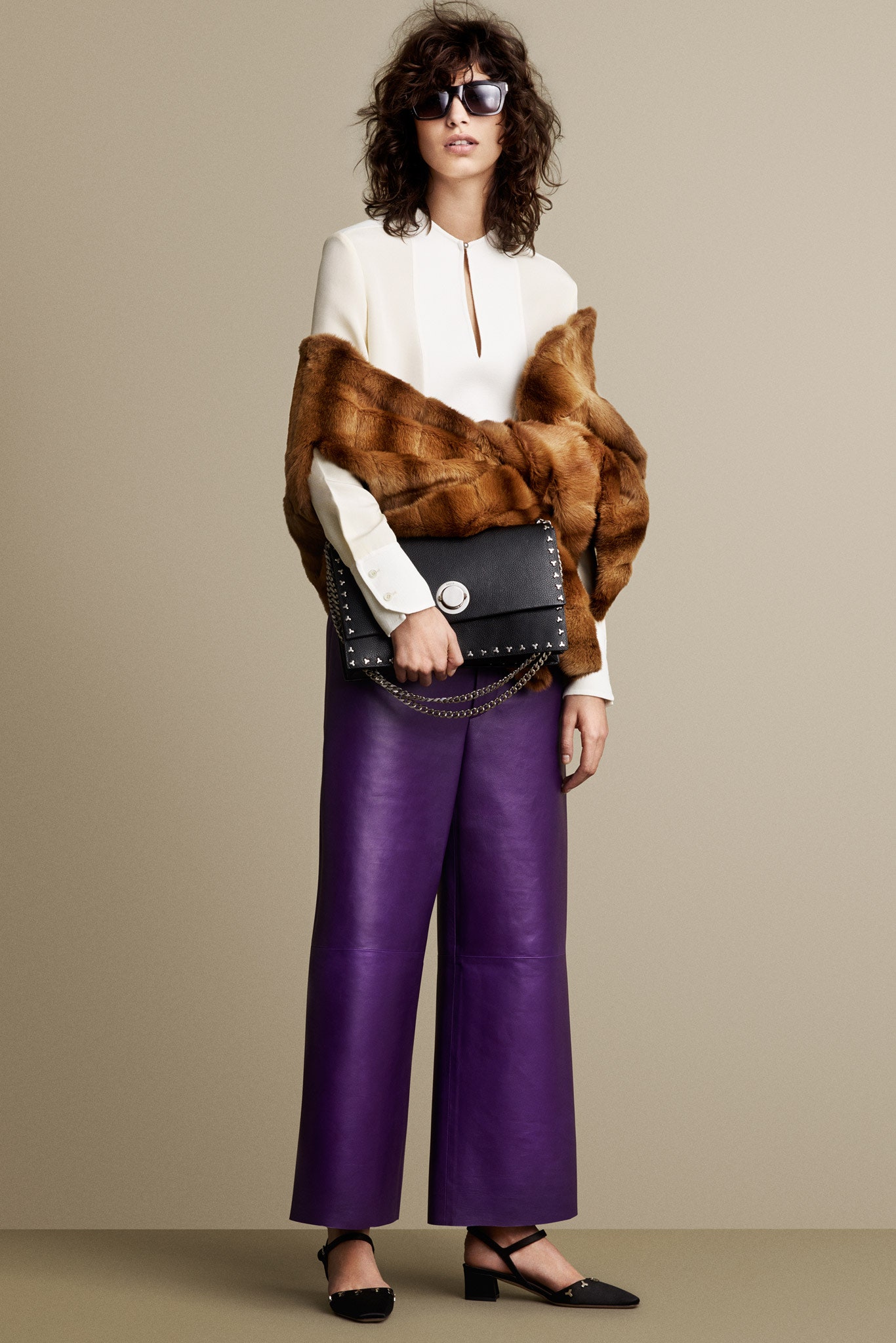 white silk blouse with purple leather pants