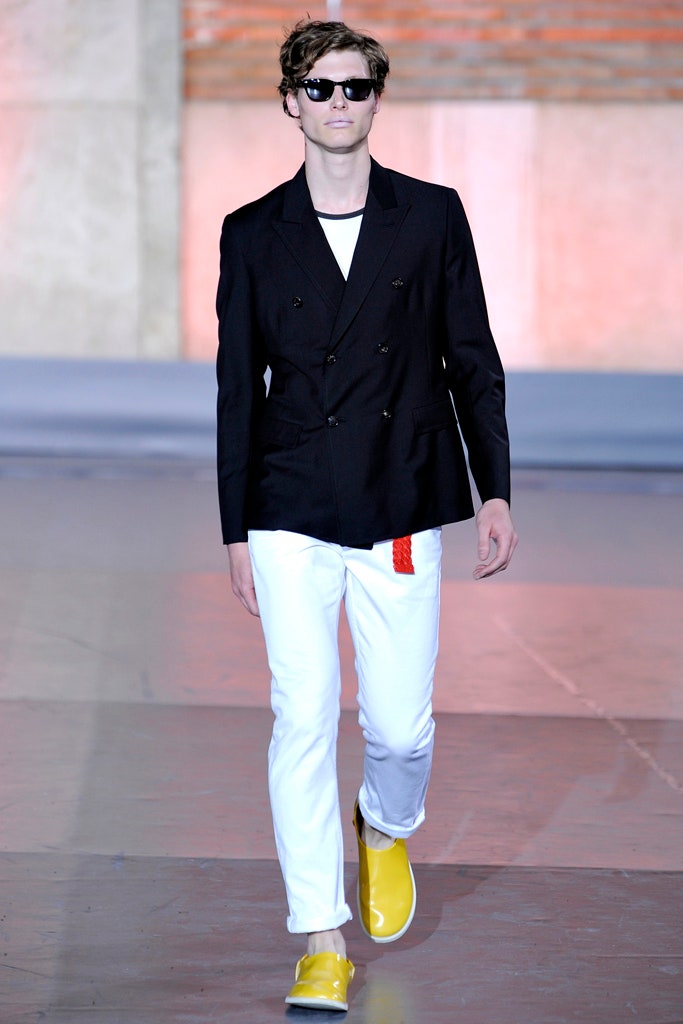 black tailored blazer with white pants