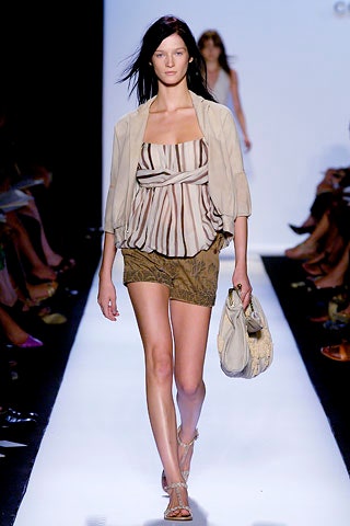 beige pleated top and brown skirt