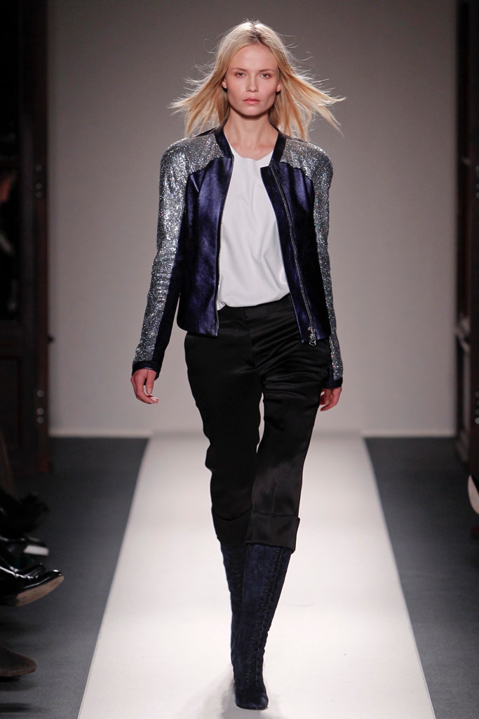 blue metallic jacket with black pants