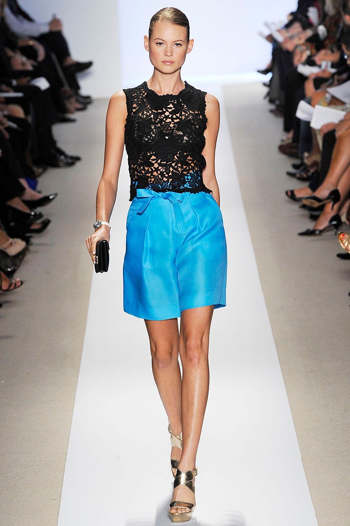 black lace top with blue shorts