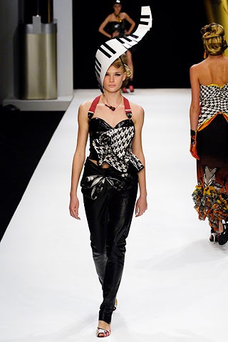 black leather fitted pants and printed top