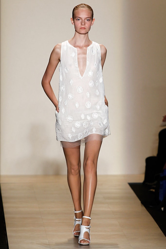 white embroidered sleeveless dress