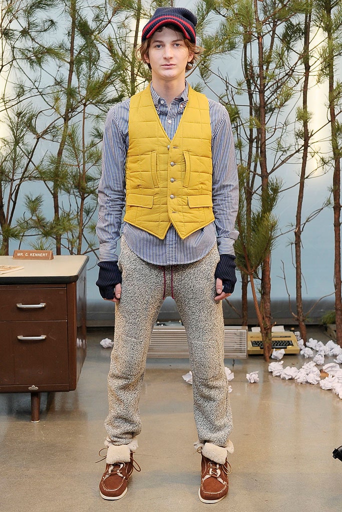 yellow fitted vest with shirt and pants