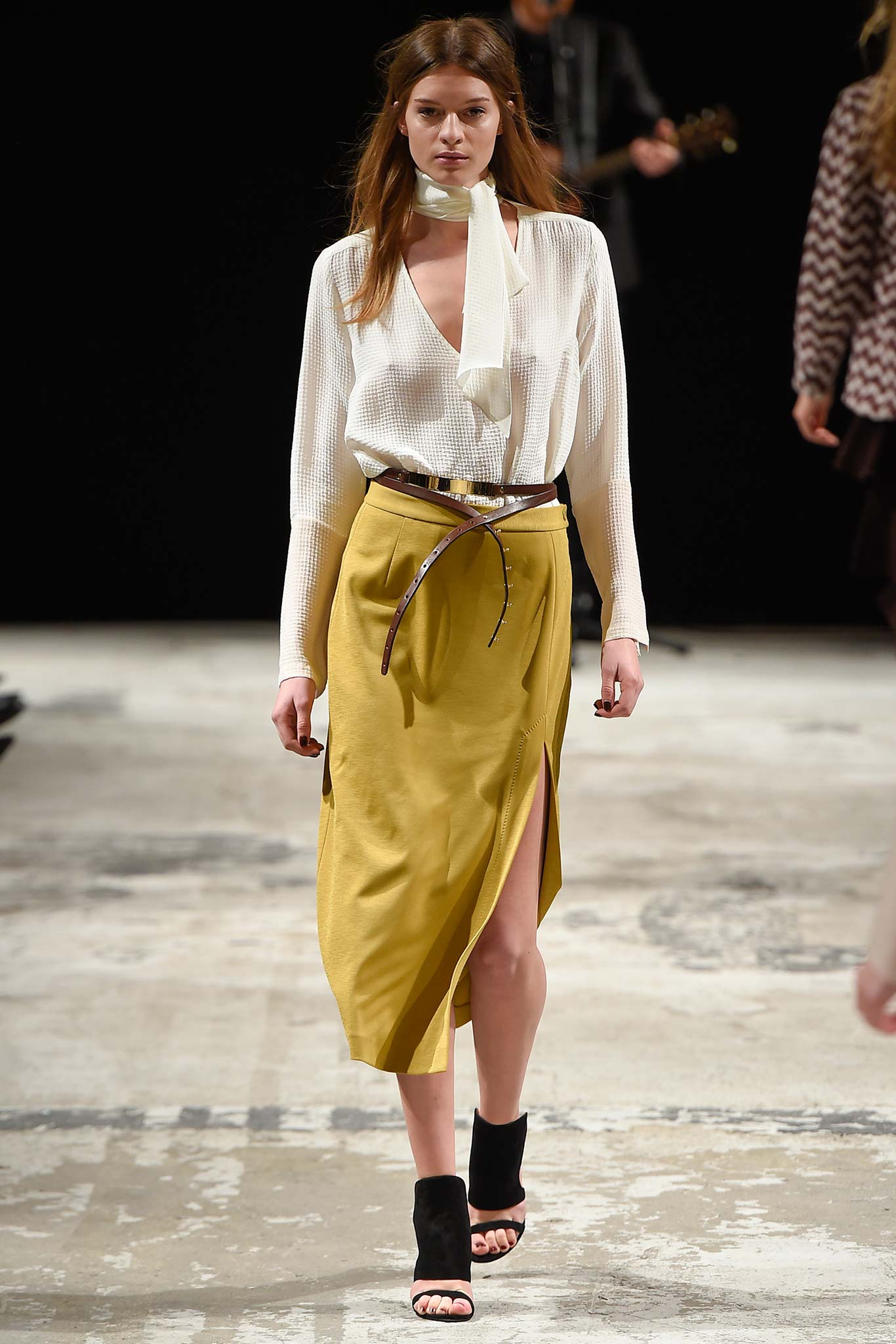 white pleated blouse yellow skirt