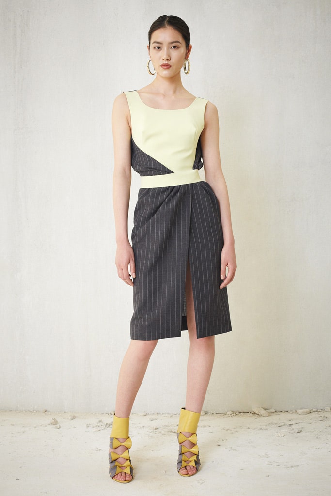 fitted black and yellow midi dress with strappy shoes