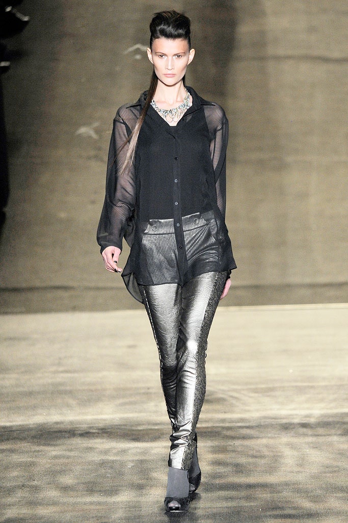 black sheer shirt with metallic pants