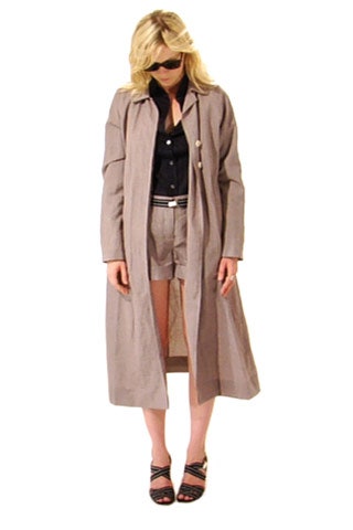 beige coat with black shirt and shorts