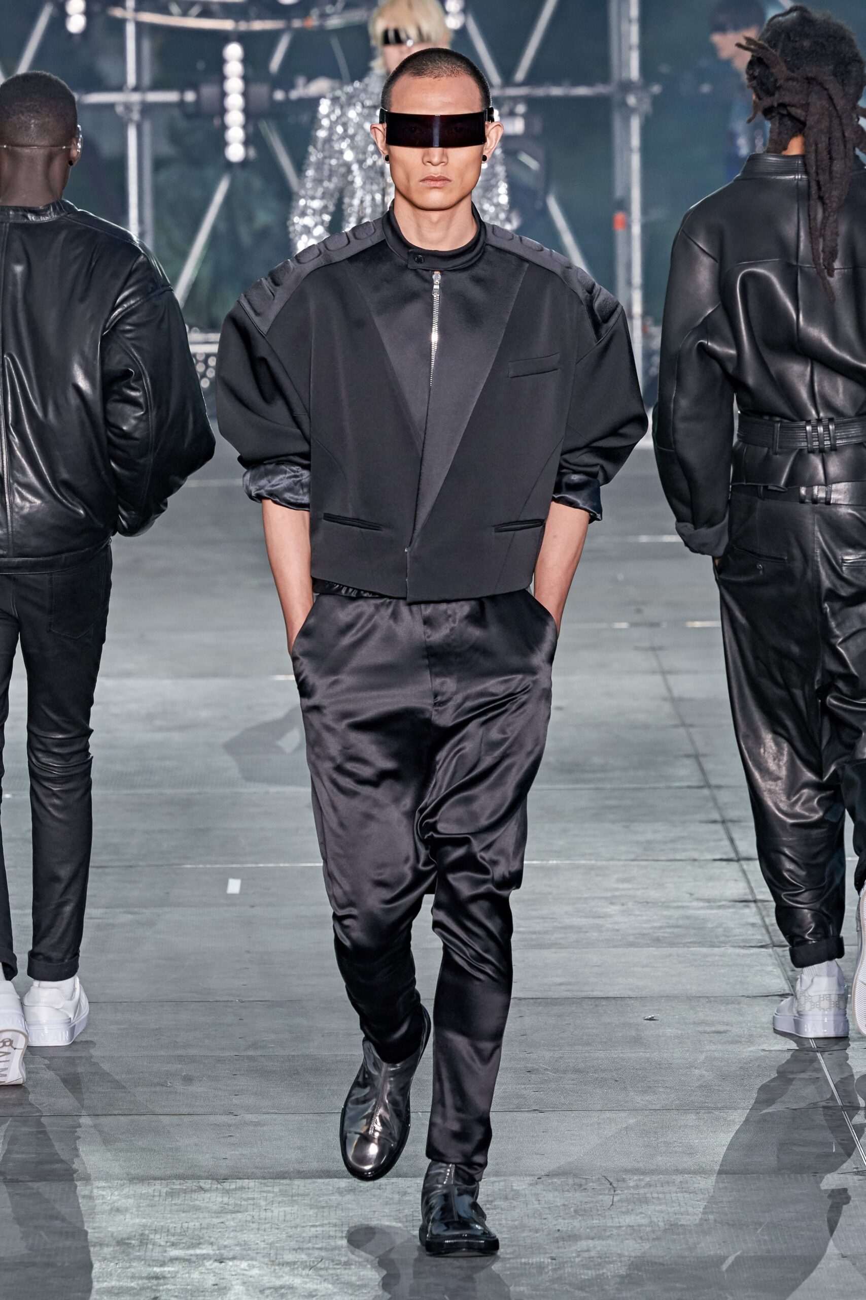 black silk fitted jacket and relaxed pants