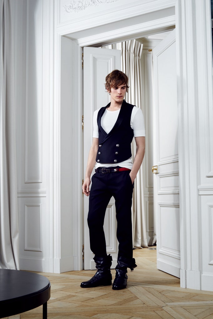 black vest white t-shirt navy pants
