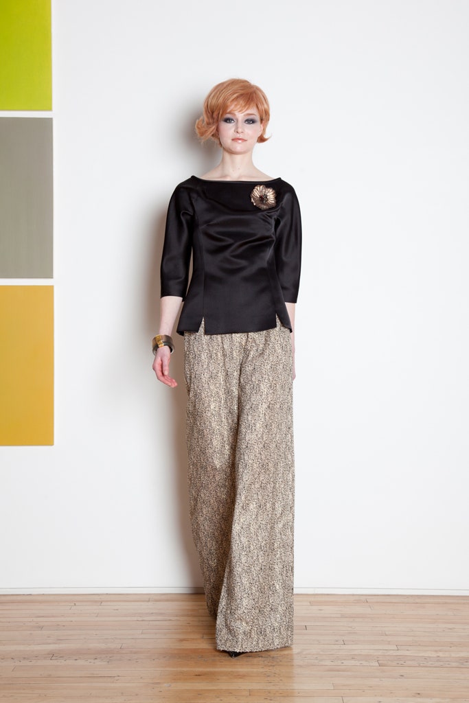 black silk top with gold pants