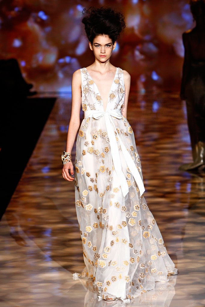 white silk sleeveless gown