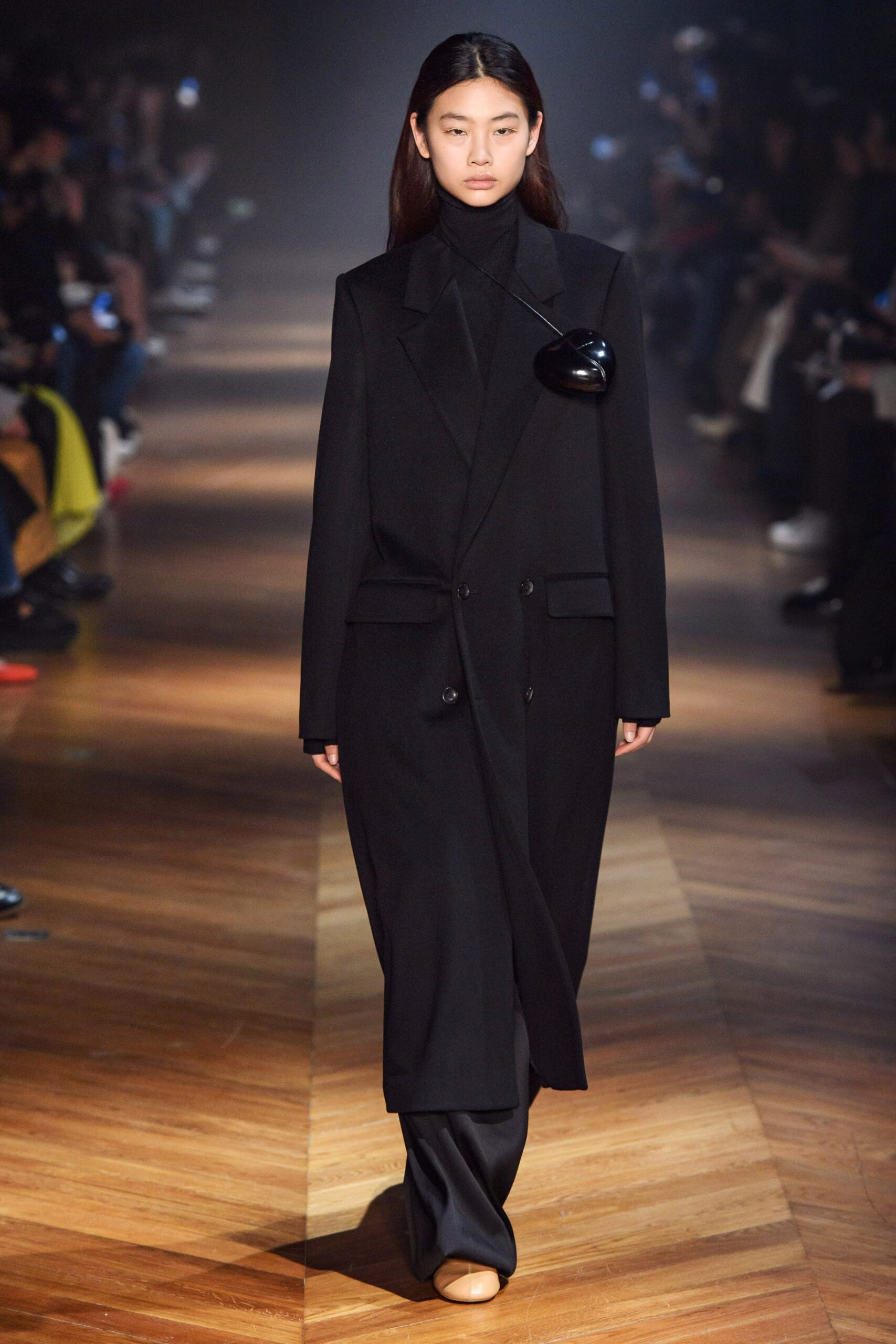 black double-breasted oversized coat