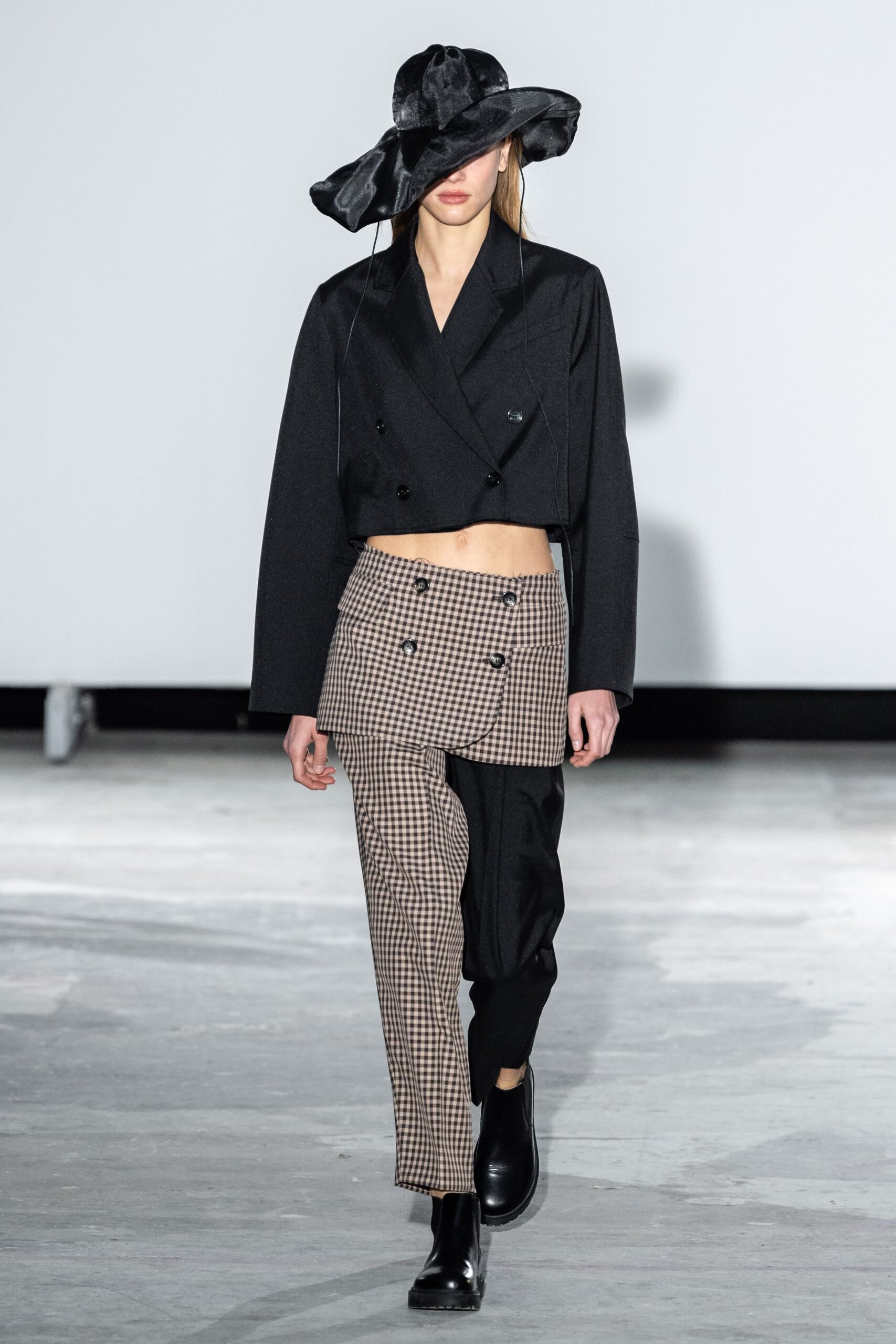 black fitted jacket with relaxed pants